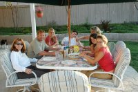 Lamsons & Schuremans eating dinner on patio of Carlsbad home 7-29-05