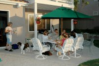 Lamsons Schuremans eating dinner on patio of Carlsbad home 7-29-05