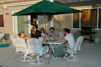 Schuremans & Lamsons eating dinner on patio of Carlsbad home 7-29-05