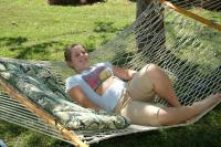 Kelly Schureman in hammock at Cameron Park home 5-27-05