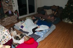 Kids sleeping on floor at Schuremans for Xmas-3 12-25-04