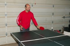 Steve playing ping pong at Schuremans in Cameron Park-1 12-26-04