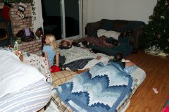 Cousins sleeping on floor of Schuremans home in Cameron Park 12-26-04