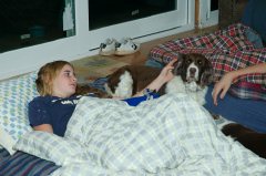 Kayla and Jasmine in bed on floor of Schuremans house 12-26-04
